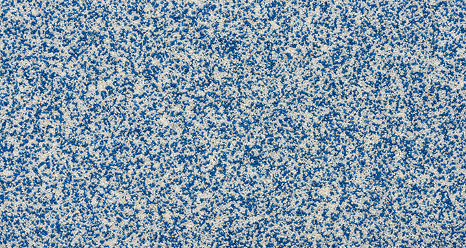 A texture background featuring a mixture of blue and light-colored speckles, resembling an abstract surface pattern. Perfect for design elements and backgrounds.